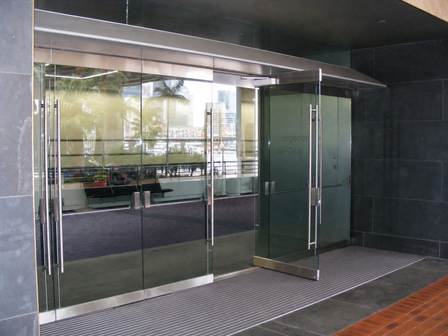 Swinging glass doors